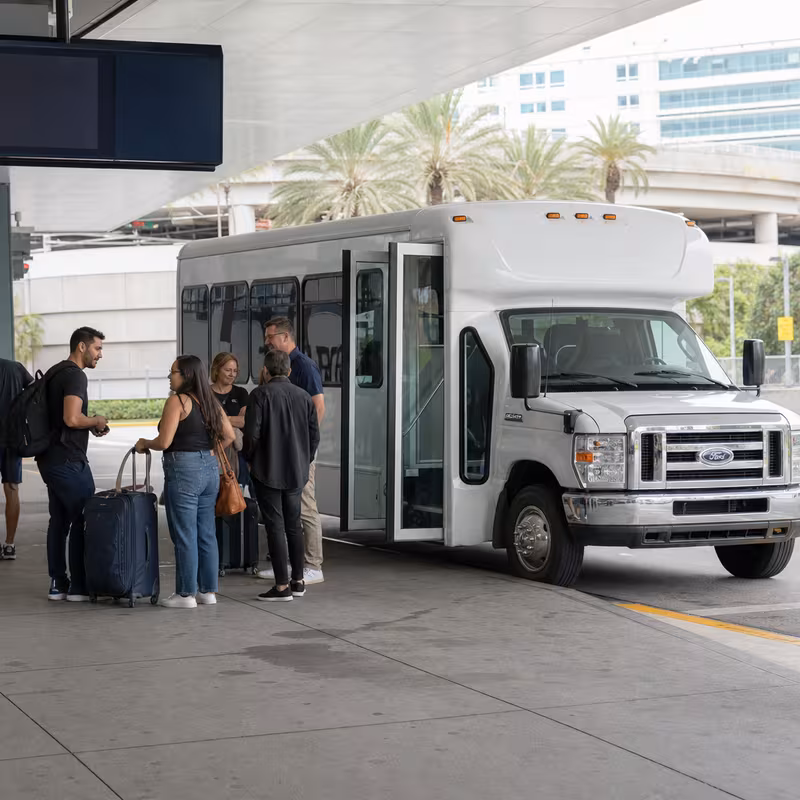 Black Mercedes Sprinter van staged for an Miami Airport Transportation group