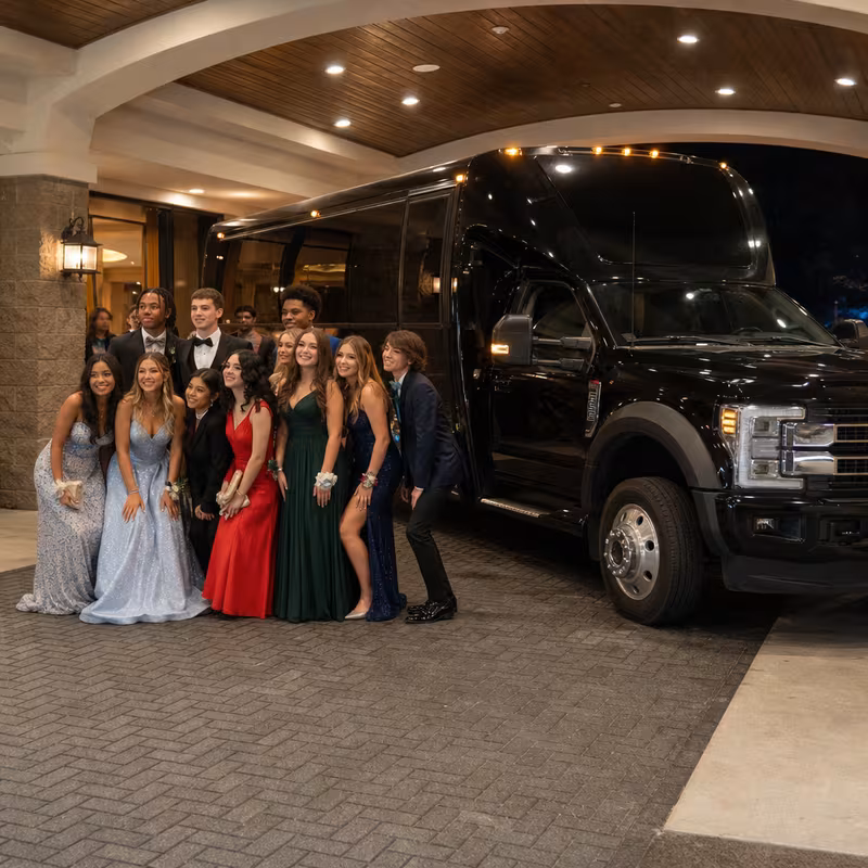 Party bus interior with wraparound leather seating and LED lighting in Miami