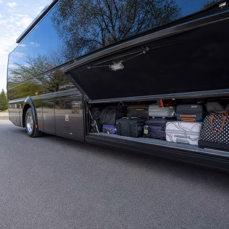 Party bus interior with wraparound leather seating and LED lighting in Miami